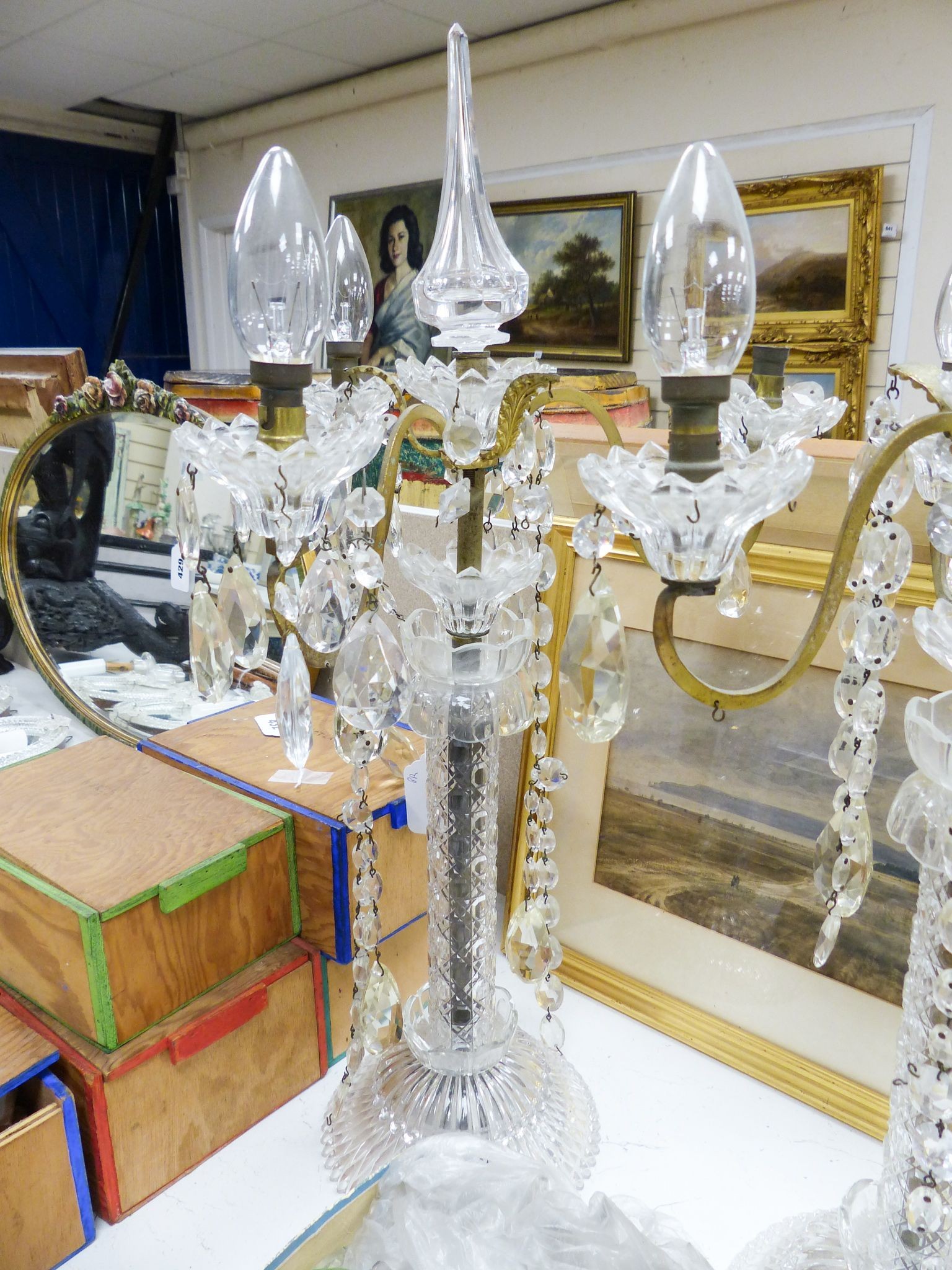 A pair of assembled glass candelabra 60cm